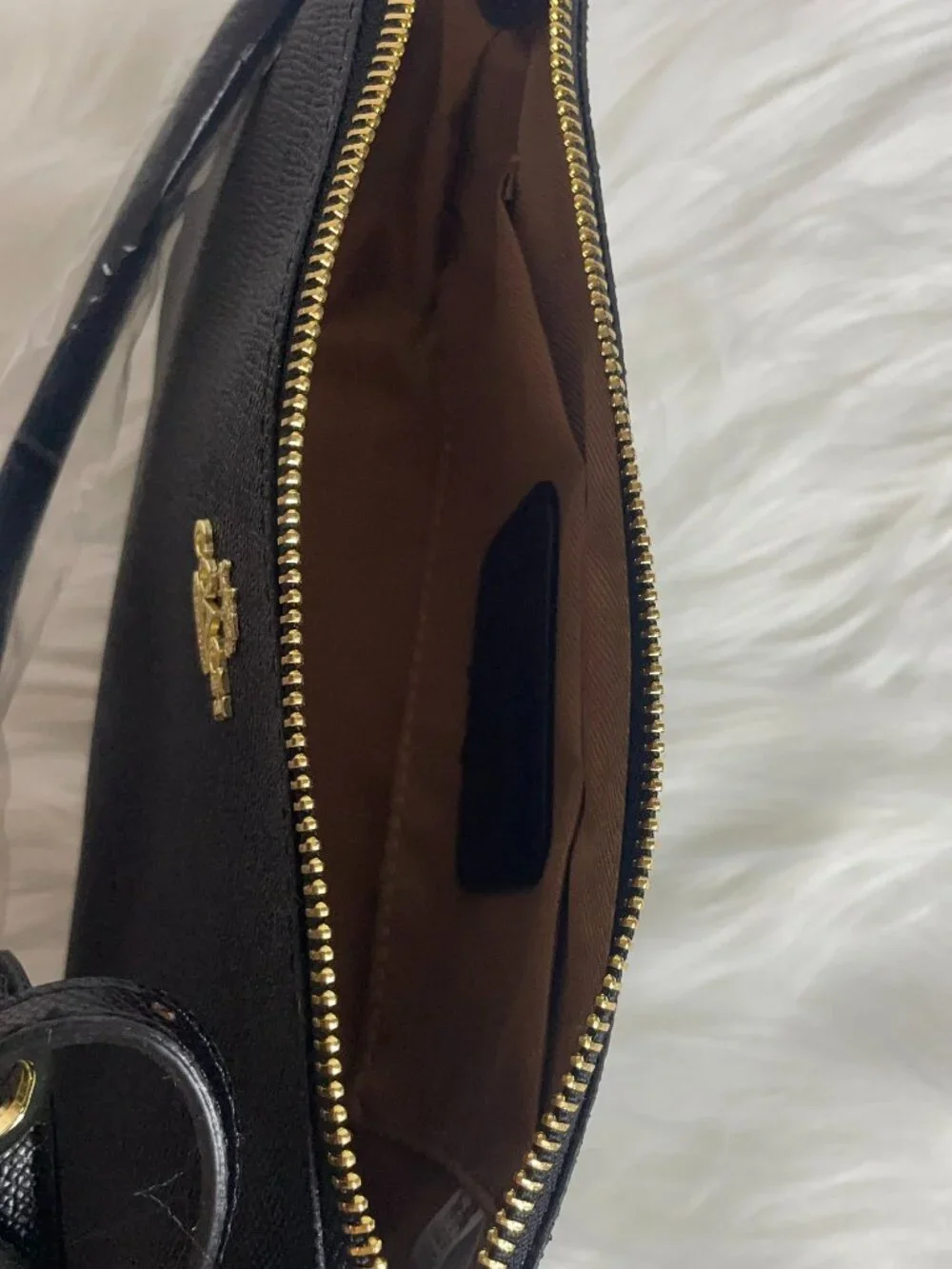 Black zipper top small shoulder bag with extra long strap